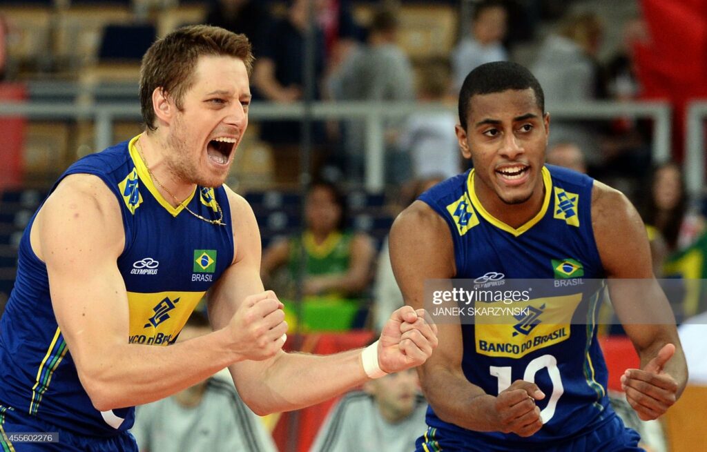 Brazil's Murilo Endres (L) and Ricardo Lucarelli Santos De Souza react during the FIVB Mens Volleyball World Championship Round 3 match Russia vs Brazil in Lodz, Poland on September 17, 2014. AFP PHOTO/JANEK SKARZYNSKI (Photo credit should read JANEK SKARZYNSKI/AFP via Getty Images)